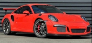 Thieves crash two Porsches through California showroom windows