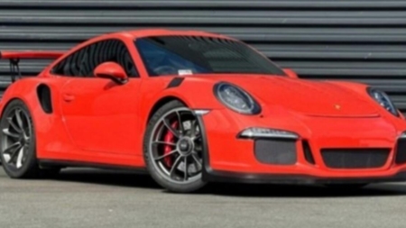 Thieves crash two Porsches through California showroom windows