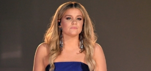 Country star Lauren Alaina cancels concerts to mourn death of her father