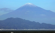 Snow finally settles on Mount Fuji, weeks after it usually appears