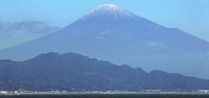 Snow finally settles on Mount Fuji, weeks after it usually appears