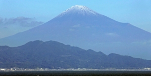 Snow finally settles on Mount Fuji, weeks after it usually appears