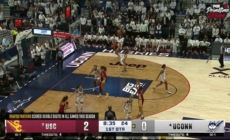 Juju Watkins drills a 3-pointer over Paige Bueckers, extending USC’s lead over UConn