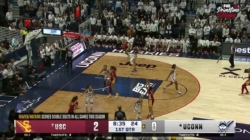 Juju Watkins drills a 3-pointer over Paige Bueckers, extending USC’s lead over UConn