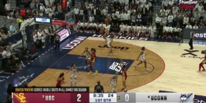 Juju Watkins drills a 3-pointer over Paige Bueckers, extending USC’s lead over UConn