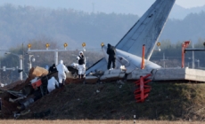 Investigators turn to black boxes for answers in South Korea plane crash