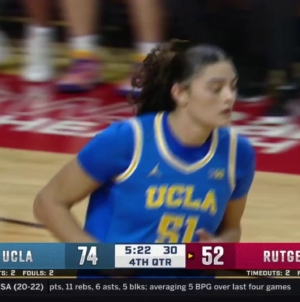 Lauren Betts muscles her way inside for the tough bucket, extending UCLA’s lead over Rutgers