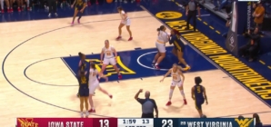 Kyah Watson hits a 3-pointer, extending West Virginia's lead over Iowa State