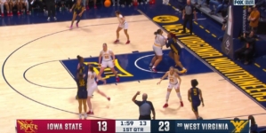 Kyah Watson hits a 3-pointer, extending West Virginia's lead over Iowa State