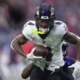 Ravens’ Zay Flowers Taken to Locker Room Following Apparent Knee Injury