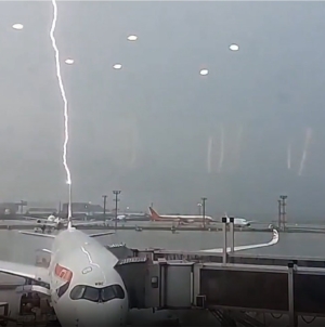 Wild video shows moment passenger plane is hit by lightening