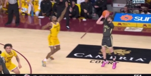 Braden Smith drains a deep 3-pointer giving Purdue the lead over Minnesota