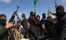 Armed Hamas militants celebrate ceasefire deal in Gaza