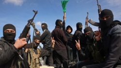 Armed Hamas militants celebrate ceasefire deal in Gaza