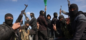 Armed Hamas militants celebrate ceasefire deal in Gaza