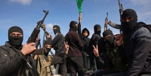 Armed Hamas militants celebrate ceasefire deal in Gaza