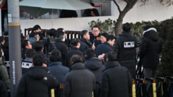 South Korean investigators abandon effort to detain impeached president after hours-long standoff