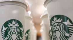 Starbucks reverses its open-door policy, requiring people to make a purchase if they want to stay