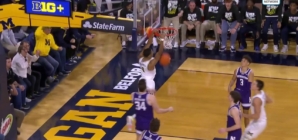 Michigan's Nimari Burnett throws down two-hand slam in overtime to extend lead against Northwestern