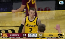 Iowa's Brock Harding gets the tough steal and finishes the layup to trim Minnesota's lead