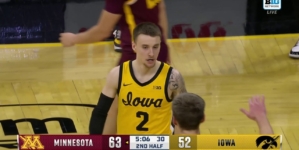 Iowa's Brock Harding gets the tough steal and finishes the layup to trim Minnesota's lead