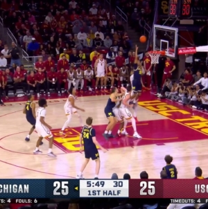 Michigan's Rubin Jones throws down a NASTY putback jam vs. USC