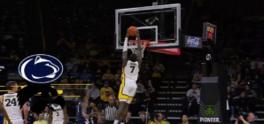 Seydou Traore throws down an alley-oop off an inbound pass to extend Iowas lead over Penn State