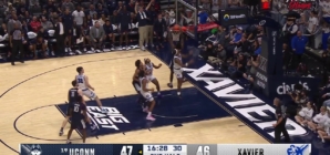 UConn's Samson Johnson flies in for the putback jam vs. Xavier