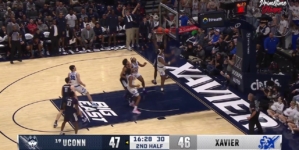 UConn's Samson Johnson flies in for the putback jam vs. Xavier