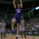 Wilhelm Breidenbach throws down a two-handed slam dunk, extending Washington's lead over Oregon