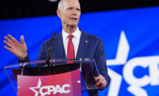 GOP’s Rick Scott Confronted on ‘Disturbance’ From Trump Economic Policies