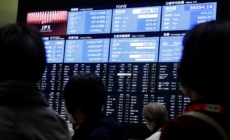 Global stocks sell-off pauses as investors catch their breath