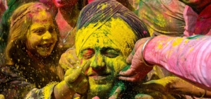 Water Balloons and Bollywood, India covers itself with color on Holi festival