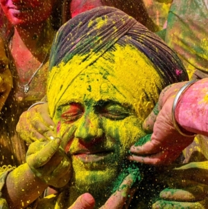 Water Balloons and Bollywood, India covers itself with color on Holi festival