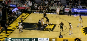 Iowa's Ladji Dembele hits a fadeaway jump shot against Michigan State