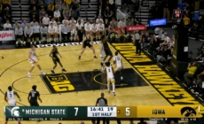 Coen Carr throws down a dunk, extending Michigan State's lead over Iowa