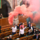 Hungarian lawmakers light flares as parliament bans Pride events