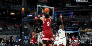 John Tonje drains his sixth 3-pointer of the game, extending Wisconsin's lead over UCLA