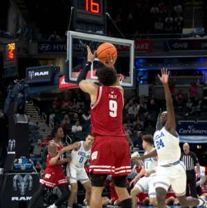 John Tonje drains his sixth 3-pointer of the game, extending Wisconsin's lead over UCLA