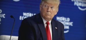 Trump blasts impeachment trial upon arrival at Davos Economic Forum