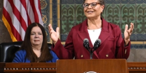 Mayor Karen Bass says she reached a deal to restore police hiring
