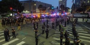 A tamer night in downtown Los Angeles, as LAPD makes more arrests, enforces curfew