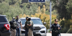 Contributor: By wearing masks, immigration agents undermine authority and endanger us all