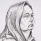 Australian woman accused of triple mushroom murders breaks down in court