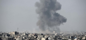 Israeli fire kills 23 people in Gaza, many at aid site, medics say