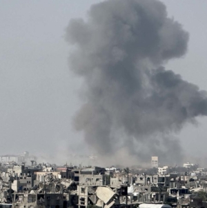 Israeli fire kills 23 people in Gaza, many at aid site, medics say