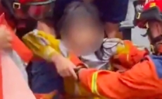 8-year-old girl pulled from sewer after 7 hours as floods batter southern China