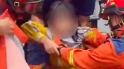 8-year-old girl pulled from sewer after 7 hours as floods batter southern China