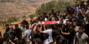 Israeli settlers rampage at a military base in the West Bank