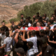 Israeli settlers rampage at a military base in the West Bank